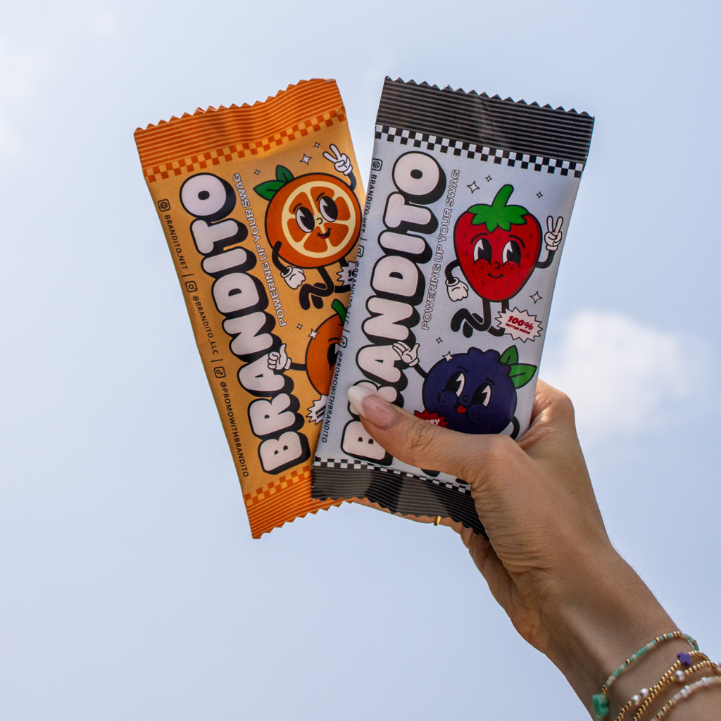 hands holding custom charger packs